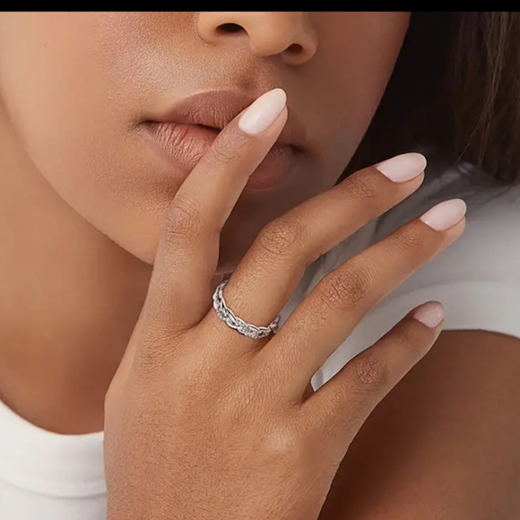 925 Stamped Sterling Silver and Cubic Zirconia Braided Infinity Ring - Picture 3 of 5